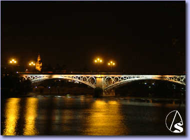 Vista de la Giralda y el Puente desde el Paseo